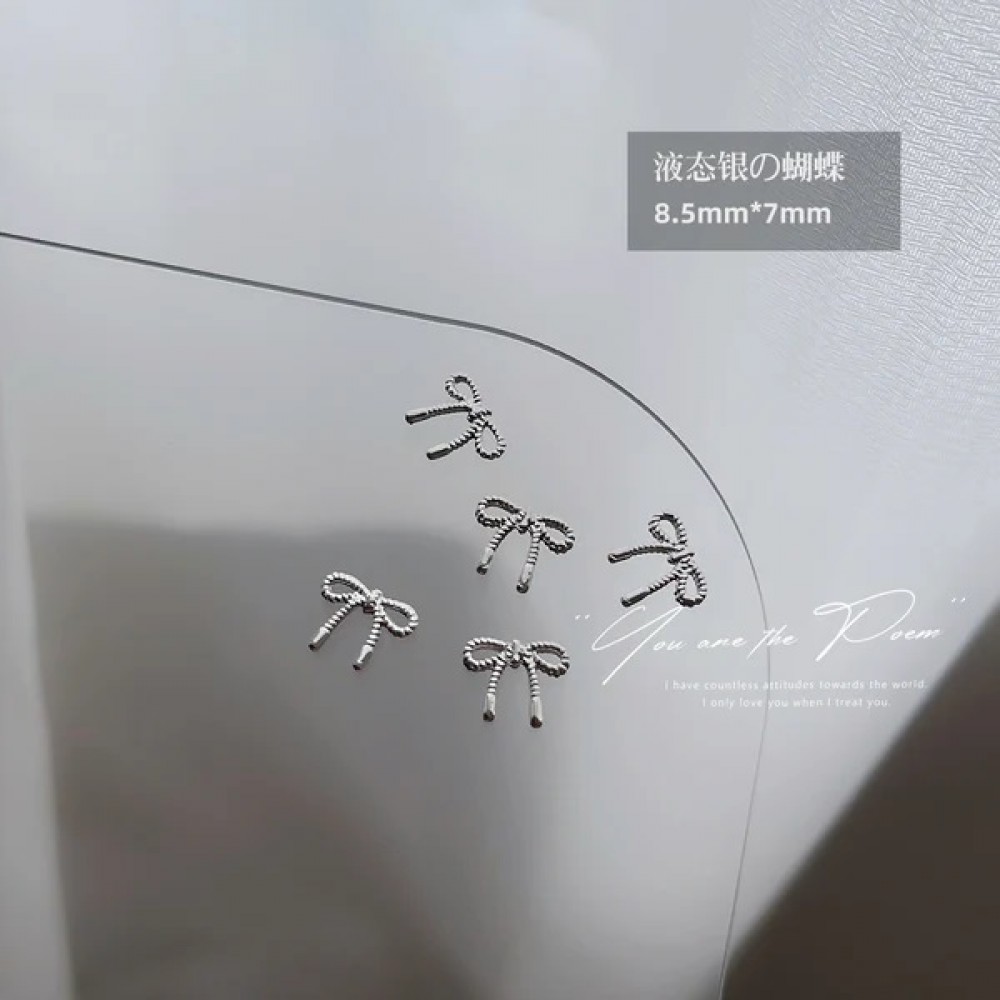 Μεταλλικά Διακοσμητικά Νυχιών Φιογκάκια- Silver Alloy Nail Art Decoration 773